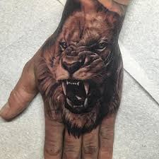 Ash Higham Lion Tattoo On Hand At Rapture Studio Lion Hand Tattoo Hand Tattoos For Guys Arm Tattoos For Guys