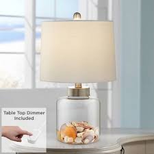The clear glass body can be filled with keepsake items, collectibles or other decorative pieces. Fillable Lamps Target