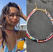 The 22 year old actress made her debut in dc's constantine in a one episode stint as the character caroline. Outer Banks Season 1 Kiara S Wrapped Choker Necklace Shop Your Tv