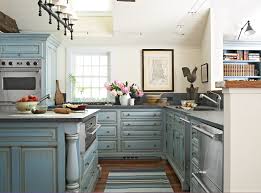 This formerly dark and uninteresting kitchen gets a whole new life with beautiful blue cabinetry, delicate pendants and roman shades with a subtle graphic print. 17 Blue Kitchen Ideas For A Refreshingly Colorful Cooking Space Better Homes Gardens