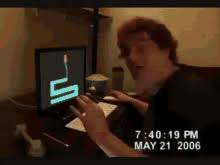 Man sitting at desk looking on computer screen. Fat Computer Nerd Gifs Tenor