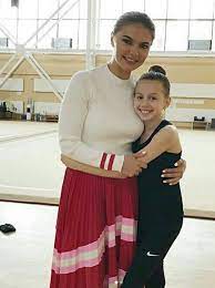 Check spelling or type a new query. Alina Kabaeva V Beloj Vodolazke I Yubke Gofre Primerila Kontrastnyj Luk