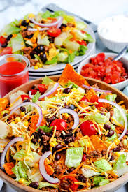The best taco salad recipe starts with seasoned beef and gets better from there, with toppings piled high—beans, corn, cheese, avocado and chips. Dorito Taco Salad With Catalina Dressing Easy Budget Recipes