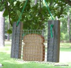 Just Insert A Slice Of Bread To Feed The Birds This Fun And Whimsical Country Bird Feeder Is Made From Recy Bird Feeders Rustic Bird Feeders Diy Bird Feeder