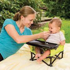 a portable booster seat that can be folded up and packed into a carrying bag summer baby portable booster baby list