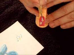 Next, create an x using smaller dots off of your center dot. Nail Art How To Use A Dotting Tool Youtube