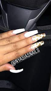 White Long Acrylic Coffin Shape Nails With Gold Flakes White Nails With Gold Gold Nails Coffin Shape Nails