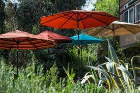 Outdoor patio umbrellas provide style and sun protection. The 5 Best Patio Umbrellas And Stands Of 2021 Reviews By Wirecutter