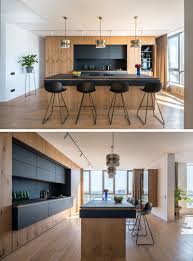 Black And Wood Kitchen Design Zooi Interior Studio Have Designed A Large And Open Apartment In Kiev Black Kitchen Countertops Modern Kitchen Design Contemporary Kitchen