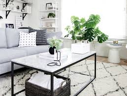 This contemporary coffee table is presented in clear glass top and black glass shelf that sits on the top of painted wood structure. Minimalist Designs Center Tables
