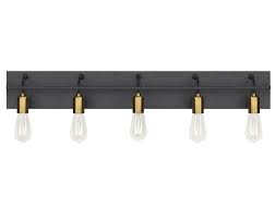 Tae Bathroom Vanity Light Marries Industrial And Modern All At Once With Exposed Hanging Bulbs Bathroom Vanity Lighting Vanity Lighting Brass Bathroom Faucets