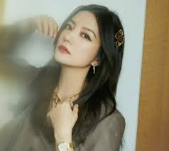 In 2001, a woman named zou xue published a picture of zhao wearing a dress. 7 6pbcqiylyntm