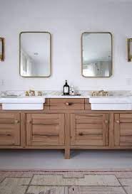 A farmhouse vanity is a vanity that has a rustic appearance to it. Apron Front Sinks In The Bathroom One Trend Two Ways Dlghtd