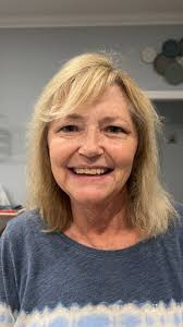 What hairstyle suggestions are suitable for a 61-year-old woman?