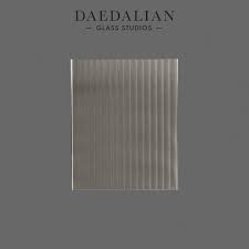 Perfect for office partitions and retail fixtures, reeded glass can be cut, drilled, and polished to your specifications. Laminated Reeded Glass With Metal Edge Trim Daedalian Glass Studios