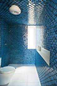 Find bathroom wall tile design ideas & options from mosaic to ceramic and natural stone. At Home In The Modern World Fish Scale Tile Fish Scale Tile Bathroom Bold Bathroom