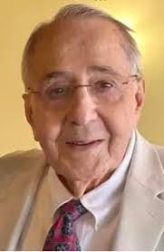 Former athletes and coaches pay final respects to old coach