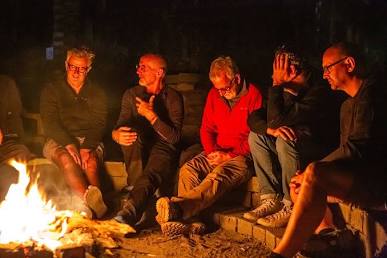 The deliberate masculine purging of stress through communal brotherhood, AI generated