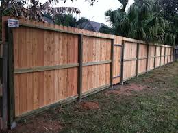 Cut the lattice screen panels down to 2 feet, 3 inches tall and cut the width so that it spans between each fence post. Blindsiding Tricks Portable Lattice Fence Concrete Fence Watches Stone Fence With Iron Fence Landscaping Slope Fence Backyard Fences Natural Fence Easy Fence