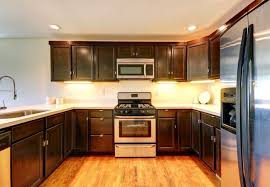 Homeadvisor members report new cabinet installations cost as much as $18,000. Kitchen Cabinet Refacing Vs Replacing Bob Vila
