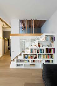 Tuck a beautiful cabinet under your stairs for a storage option that is as purposeful as it is gorgeous. Barcelona Jenny Lind Bookcase Staircase Contemporary With Multi Function Armchairs Under Stairs Storage