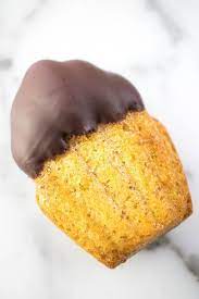 Chocolate Dipped Madeleines A Hedgehog In The Kitchen Recipe Gourmet Chocolate Recipes Gourmet Chocolate Chocolate Dipped