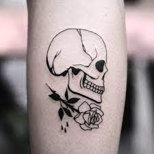 Black Skull And Rose Tattoo By Tattooist Eddison Skull Rose Tattoos Skull Tattoo Pirate Skull Tattoos