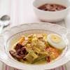 Lontong lazimnya disajikan dengan sate, rojak atau gulai kambing. 1