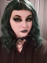 Halloween-inspired goth look with double wing lashes