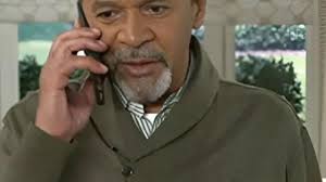 Beyond The Gates 2025 Clifton Davis Green Shawl Collar Sweater worn by  Vernon Dupree (Clifton Davis) in Beyond the Gates