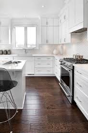 That wider spacing prevented trapped crumbs. White Glazed Porcelain Arabesque Backsplash Tile Backsplash Com