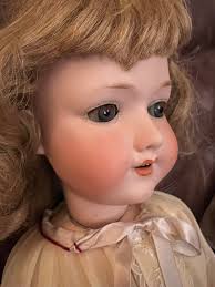 Does anyone own a real antique Izannah Walker doll?