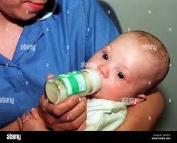 Cared for baby hi-res stock photography and images