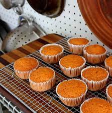 Thai Iced Tea Cupcakes With Condensed Milk Buttercream Recipe Tea Cup Cake Thai Tea Recipes Tea Recipes
