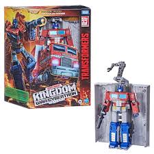 Optimus prime (オプティマス・プライム, oputimasu puraimu), a cybertronian was once a simple data clerk under the name orion pax (オライオン・パックス, oraion pakkusu), and satisfied with his job. Optimus Prime Transformers War For Cybertron Kingdom Collectible Action Figure Smyths Toys Ireland