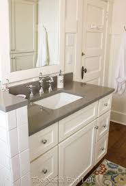 Black Bathroom Cabinets With White Countertops Love This Look The White Cabinet Dark Quartz Top And The Tap Ware Wouldn T Even Mind This Colo Grey Countertops Bathroom Countertops Bathroom Remodel Master
