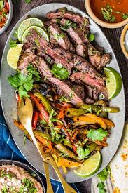 Steak And Vegetable Fajitas On A Large Serving Plate In 2020 Steak Fajita Recipe Best Steak Fajitas Steak Fajitas
