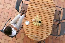 Wood deck and paver patio. Which Is Cheaper A Deck Or A Patio Howstuffworks