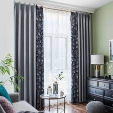 The way these curtains hang in perfectly straight lines thanks to their grommet header, adds the perfect finishing touch to this blue living room design scheme, framing the windows in beautiful clean lines with a subtle color change from the blue. Navy Leaf Blackout Curtains Gray Thermal Insulated Splicing Drapes Anady Top