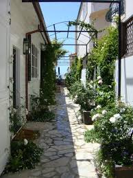 Design Ideas Pictures Remodel And Decor Small Courtyard Gardens Spanish Courtyard Garden Entrance