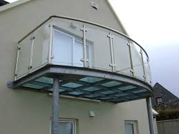 View photo of sliding door, . Modern House Balcony Glass Design
