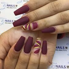 matte burgundy nails with a pop of gold