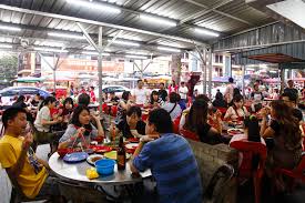 In malaysia the state religion of islam forbids the selling of alcohol in the predominant muslim (halal) establishments of the city. Wong Ah Wah Famous Chicken Wings Jalan Alor Kl