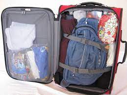 Pack A Carry On Suitcase For A 10 Day Trip Squawkfox Carry On Suitcase Packing Tips For Travel Travel Packing