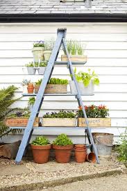 Bold and bright painted post garden decorations. 35 Backyard Decorating Ideas Easy Gardening Tips And Diy Projects