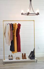 Black And Gold Clothes Rail Standard Choose Between 60 48 Or 36 Wide Top Of Bar To Base Is 60 Tall Top Of Bar To Wheels Is About 64 Tall Clothing Rack Rolling Clothes Rack Rolling Rack
