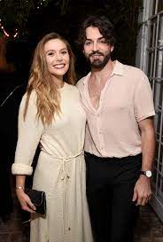 Born robert nicholas arnett on 3rd march, 1992 in u.s.a., he is famous. How Much Older Is Mcu Star Elizabeth Olsen Than Her Fiance Robbie Arnett