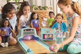 Now readingfrom addy to samantha: American Girl Makes 5 000 Doll Covered In Swarovski Crystals