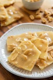 Peanut Brittle Is One Of The Best Holiday Treats And Is So Easy To Make Yourself It Tastes Wonderful Made Brittle Recipes Peanut Brittle Recipe Peanut Brittle
