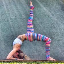 Deep Forearm Back Bend Wheel Pose With One Leg Extended Straight Up